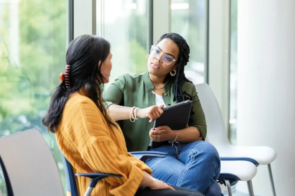 Mental Health Worker having a discussion with an individual suffering from mental health